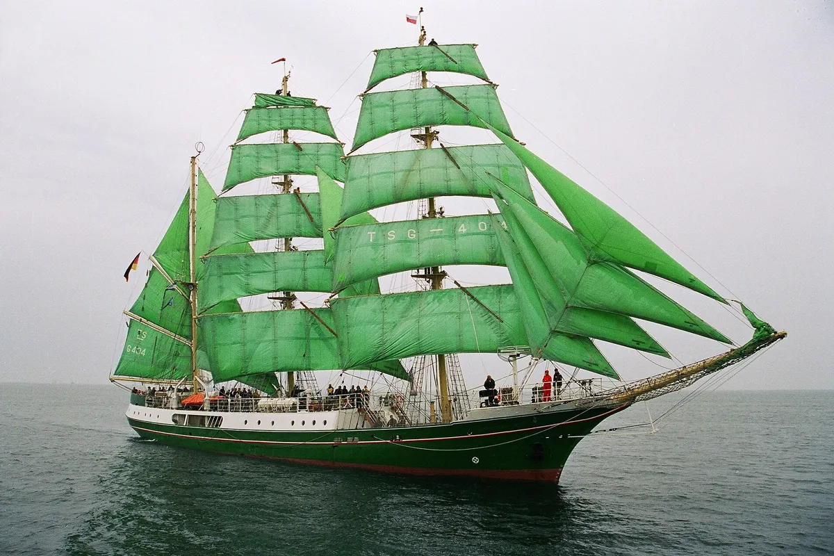 Alexander von Humboldt tall ship with green sails sailing at sea
