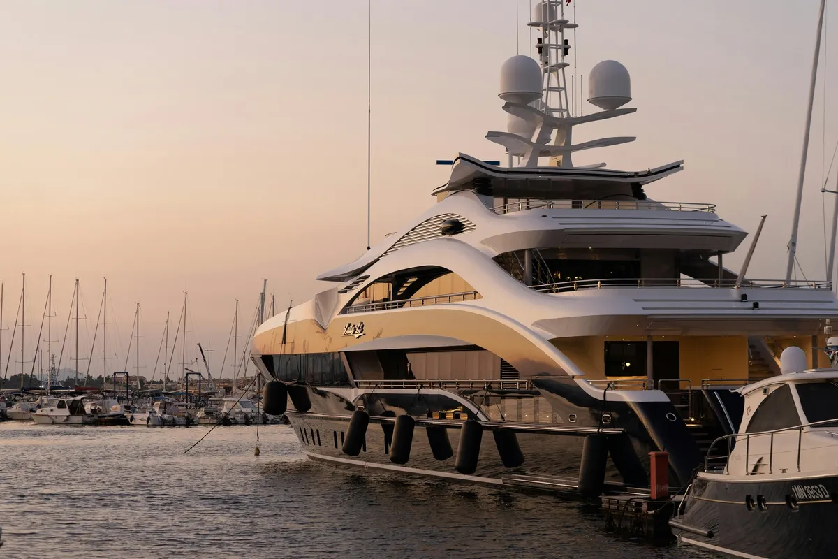 Luxury floating superyacht accommodation moored in a marina