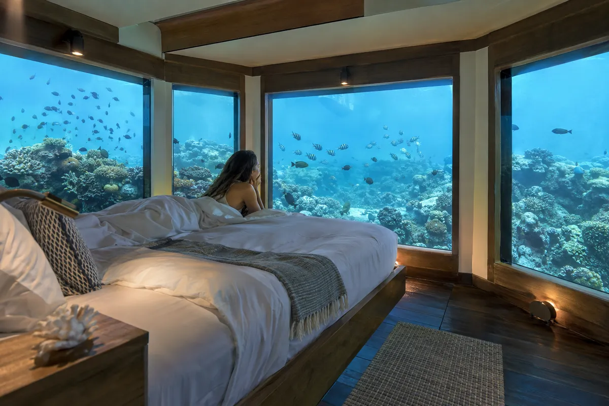 The Manta Resort underwater room with panoramic windows overlooking the Indian Ocean