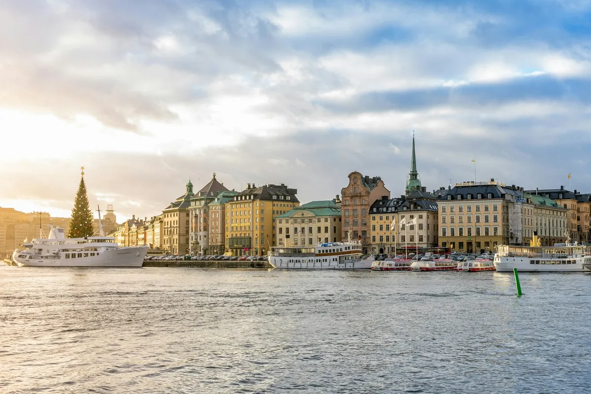 Moored hotel ships on Lake Mälaren in Stockholm at sunset