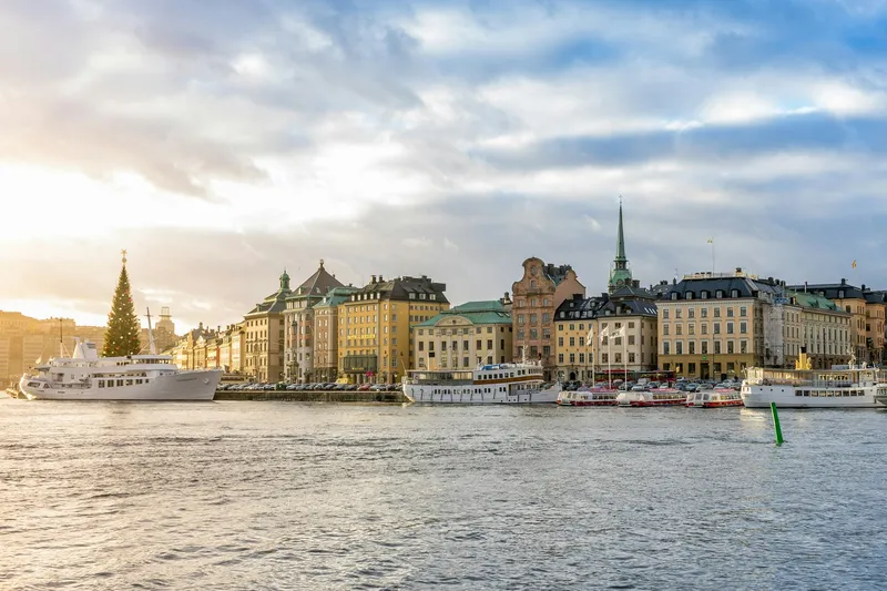 Moored hotel ships on Lake Mälaren in Stockholm at sunset